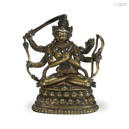 A RARE AND FINE SILVER-AND-COPPER-INLAID BRONZE FIGURE OF NA...