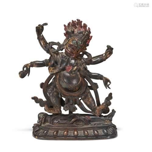 A BRONZE FIGURE OF MAHAKALA TIBET, 18TH-19TH CENTURY