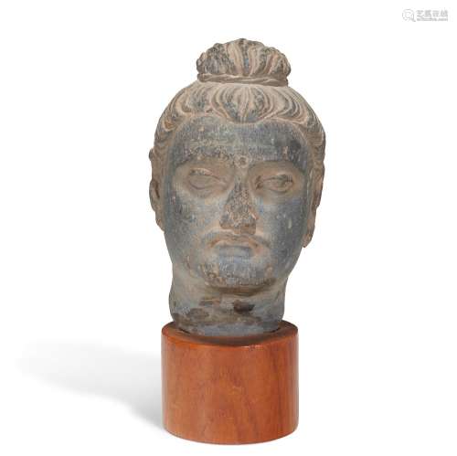 A GREY SCHIST HEAD OF BUDDHA ANCIENT REGION OF GANDHARA, 3RD...