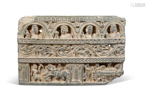 A GREY SCHIEST RELIEF WITH BALCONY FIGURES ANCIENT REGION OF...