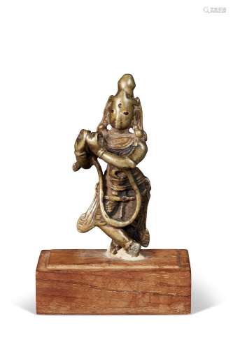 A SMALL BRONZE FIGURE OF KRISHNA VENUGOPALA INDIA, 17TH CENT...