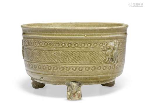 A MOLDED YUE TRIPOD CENSER.CHINA, WESTERN JIN DYNASTY (AD 26...