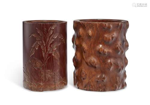 A CARVED HUALI ROOT-FORM BRUSH POT AND A BAMBOO BRUSH POT.CH...