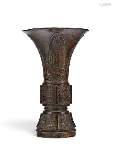 A BRONZE ARCHAISTIC GU-FORM VASE.CHINA, 17TH-18TH CENTURY