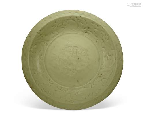 A CARVED LONGQUAN CELADON CHARGER  MING DYNASTY (1368-1644)