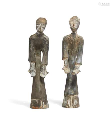 A PAIR OF PAINTED POTTERY FIGURES OF ATTENDANTS  HAN DYNASTY...