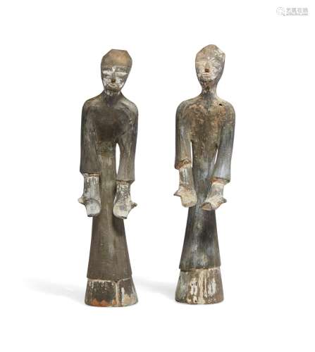 A PAIR OF PAINTED POTTERY FIGURES OF ATTENDANTS  HAN DYNASTY...