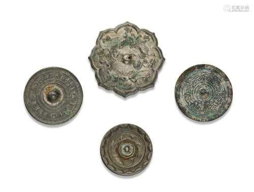 A GROUP OF FOUR SMALL SILVERY BRONZE MIRRORS  EASTERN HAN-TA...