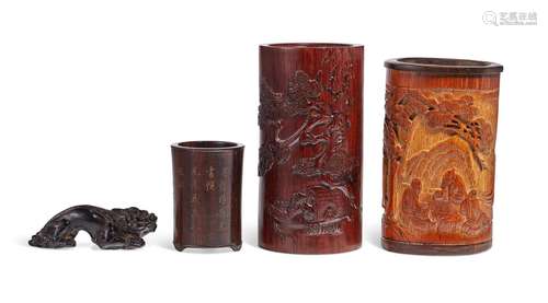 THREE WOODEN BRUSH POTS AND A ZITAN CARVING OF A MYTHICAL BE...