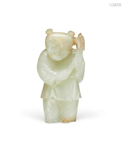 A GREENISH-WHITE JADE CARVING OF A BOY AND LOTUS  QING DYNAS...