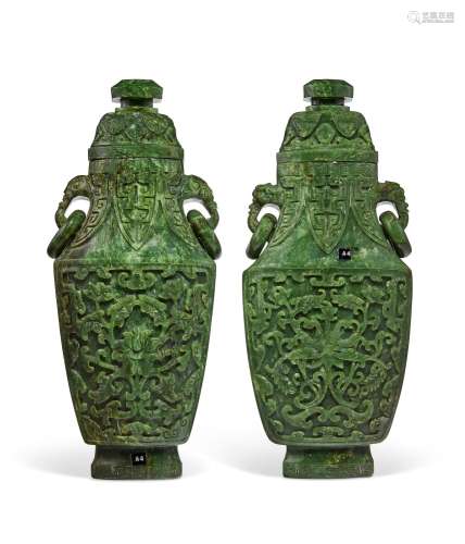 TWO CARVED SPINACH-GREEN JADE VASES AND COVERS  LATE QING DY...