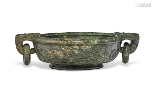 A MOTTLED DARK GREEN JADE `MARRIAGE BOWL’