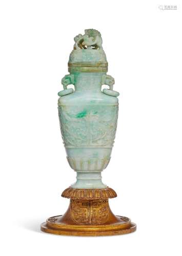 A GREYISH-WHITE AND GREEN JADEITE VASE AND COVER