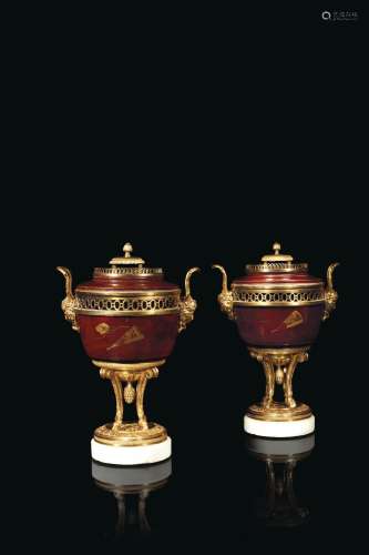 A PAIR OF LOUIS XVI ORMOLU-MOUNTED RED JAPANESE LACQUER POTS...