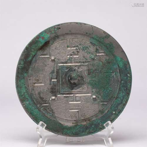 A CHINESE BRONZE MIRROR