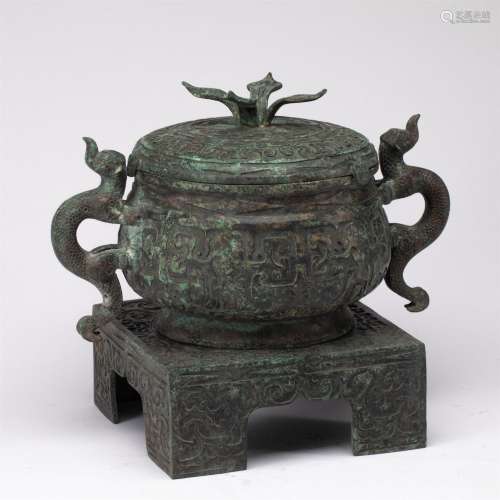 A CHINESE BRONZE ORNAMENTS