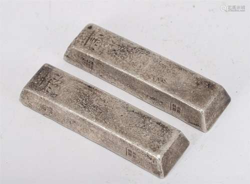 A PAIR OF CHINESE SILVER BARS