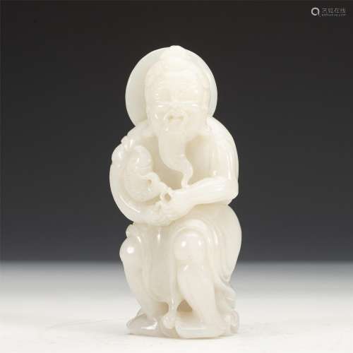 A CHINESE WHITE JADE FIGURE ORNAMENTS