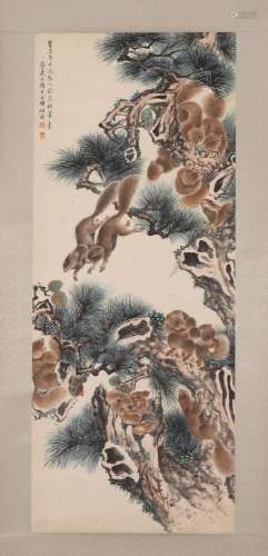 A CHINESE PAINTING OF SQUIRRELS AND PINE TREE