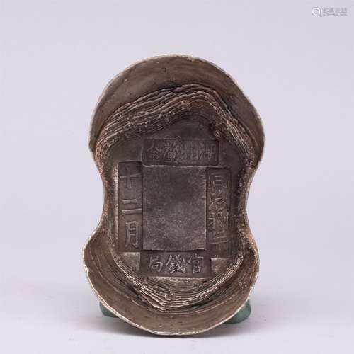 A CHINESE SILVER INGOT ORNAMENTS