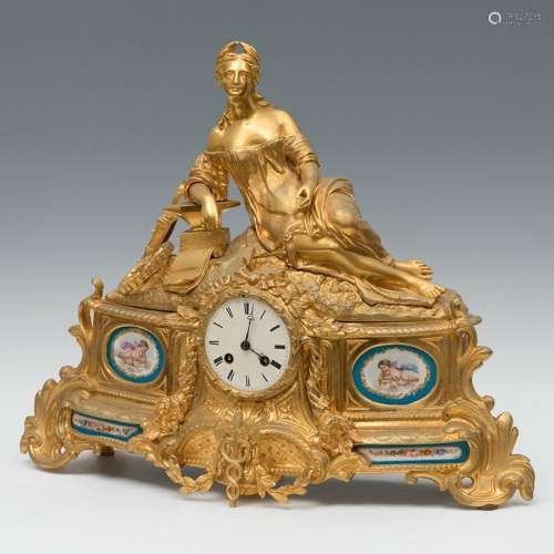 Table clock; Napoleon III, ca. 1870.Gilt bronze and porcelai...