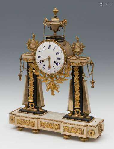 Table clock; Louis XVI, late 18th century.Gilt bronze, porce...