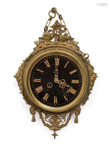 Wall clock; early 20th century.Brass.In need of repair and r...