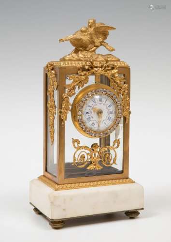 Louis XVI style clock, late 19th century.Gilt bronze, rhines...