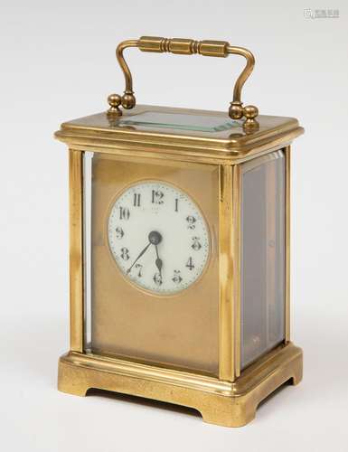 Travel clock, 19th century.Bronze and bevelled glass.Key pre...