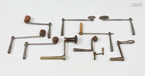 Set of 10 crank keys; 18th-20th century.Iron, bronze and woo...