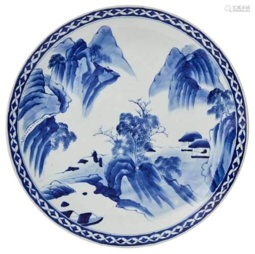 A JAPANESE BLUE AND WHITE PORCELAIN CHARGER