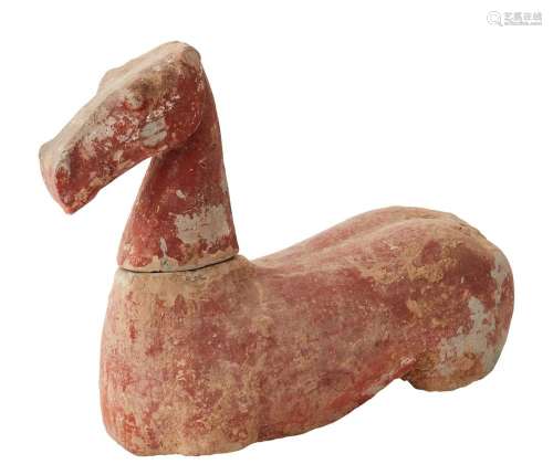 A CHINESE BUFF POTTERY HORSE