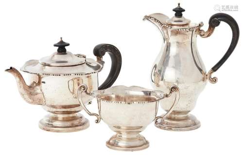 A GEORGE V SILVER THREE PIECE TEA SERVICE