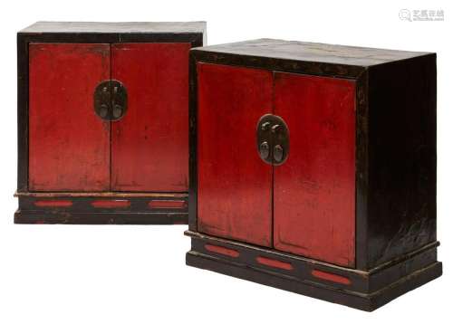 A PAIR OF CHINESE RED AND BLACK LAQUERED TWO-DOOR CABINETS