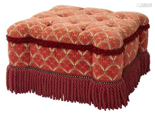 AN UPHOLSETERED OTTOMAN