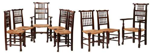 A MATCHED SET OF EIGHT BEECH AND ELM SPINDLE BACK DINING CHA...