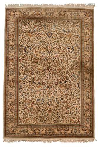 A HAND KNOTTED PERSIAN STYLE CARPET