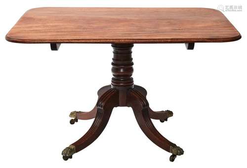 A REGENCY MAHOGANY BREAKFAST TABLE