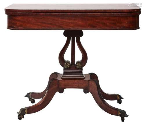 A REGENCY MAHOGANY TEA TABLE