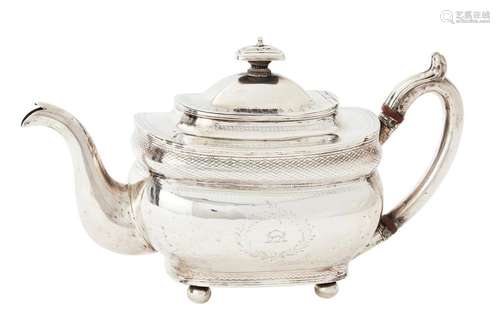 AN IRISH GEORGE III SILVER TEAPOT