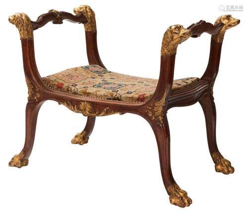 A LOUIS XV STYLE PARCEL GILT BEECH CURULE STOOL