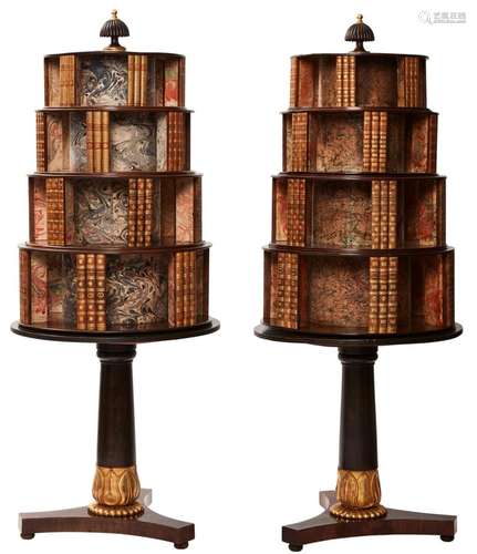 A PAIR OF FREESTANDING MAHOGANY AND PARCEL GILT REVOLVING BO...