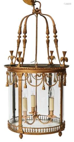 A LOUIS XVI STYLE ORMOLU THREE-LIGHT LANTERN