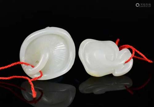 A Group of 2 White Jade Lingzhi Toggles Qing