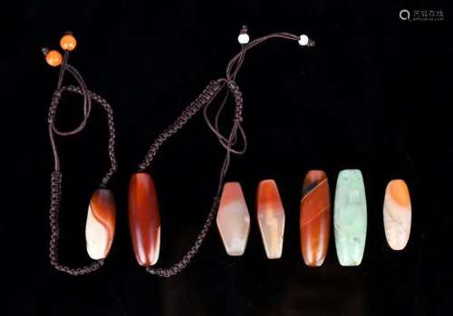 A Group of 7 Agate Beads