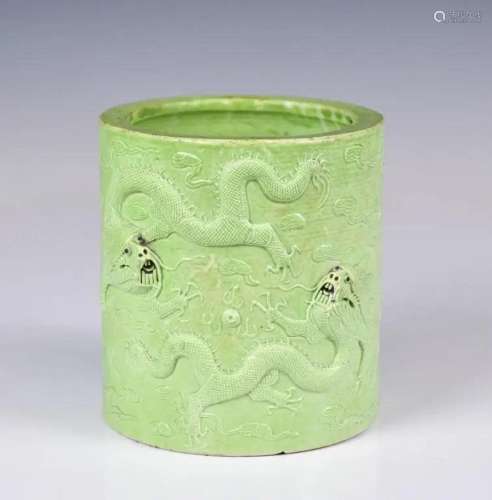 A Green Carved Porcelain Brush Pot (hairline)