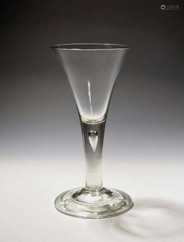 A large toasting glass or goblet c.1750, the generous drawn ...