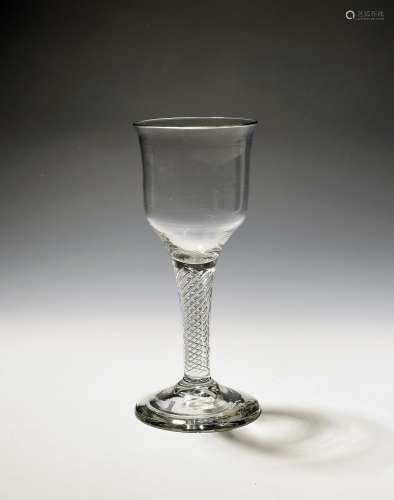A large wine glass or goblet c.1750, the ogee bowl raised on...