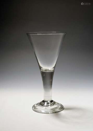 A large toasting glass or goblet c.1750, the generous drawn ...