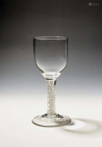 A large wine glass or goblet c.1765, the rounded bowl raised...